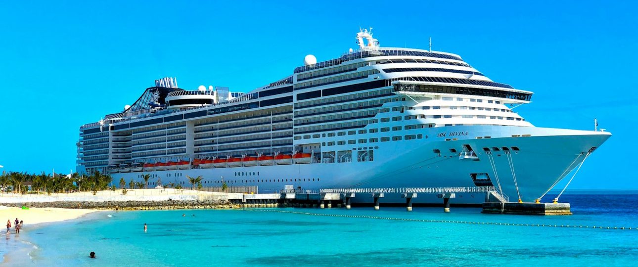 white cruise ship on sea during daytime